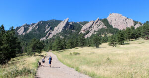 People hiking at The Flatirons: rock formations at Chautauqua Park, Boulder