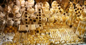 ISTANBUL, TURKEY - MAY 26, 2018: Gold jewelry in window of jewelry store in Spice Bazaar. The Spice Bazaar is one of the oldest bazaar in Istanbul.