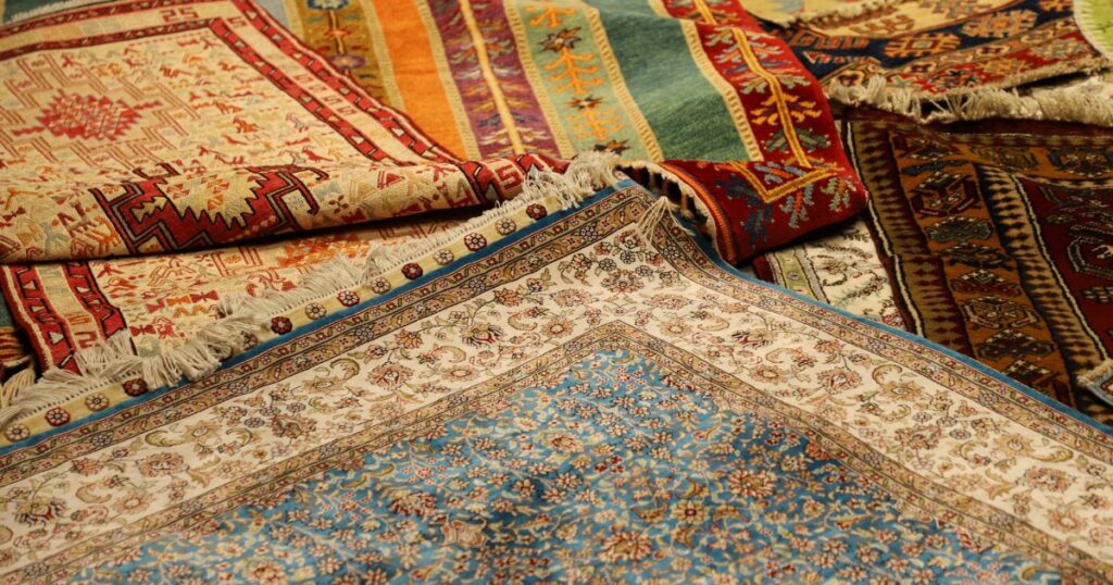 Shutterstock Close up of colourful layered rugs in Bergama, Turkey