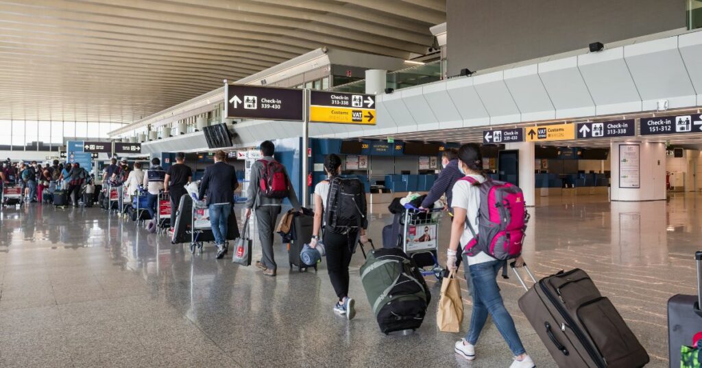 Shutterstock A long queue at an airport