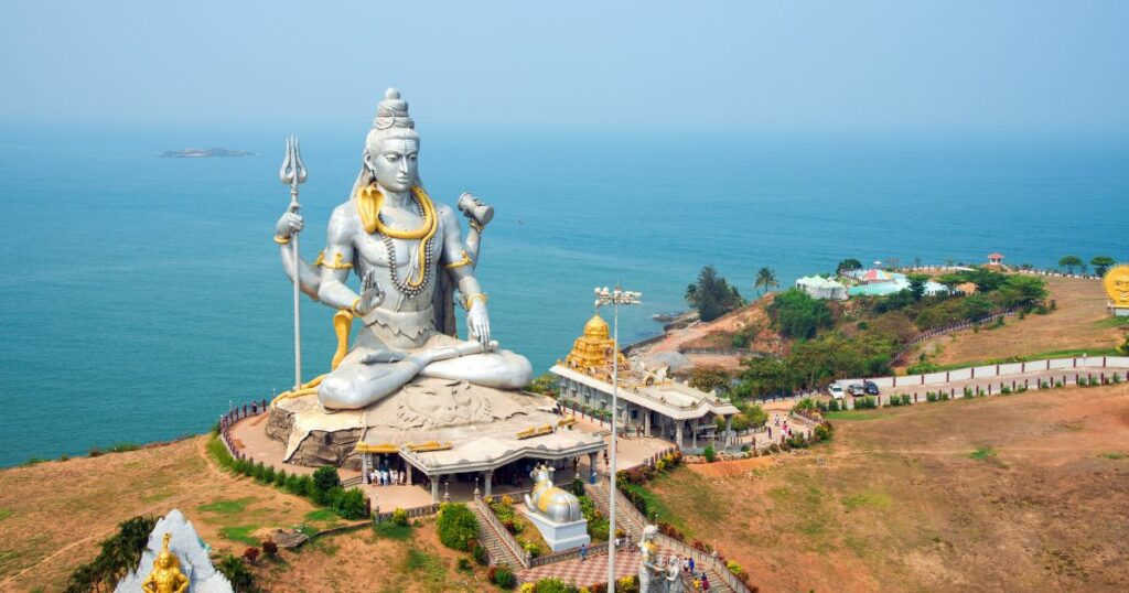 Shutterstock Top view of a religious complex with a giant statue of Lord Shiva in Murudeshwar, Karnataka, India