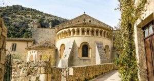 View of Gellone Abbey in Saint-Guilhem-le-Désert, a masterpiece of Romanesque architecture, on the way to Santiago de Compostela (Occitanie, France)