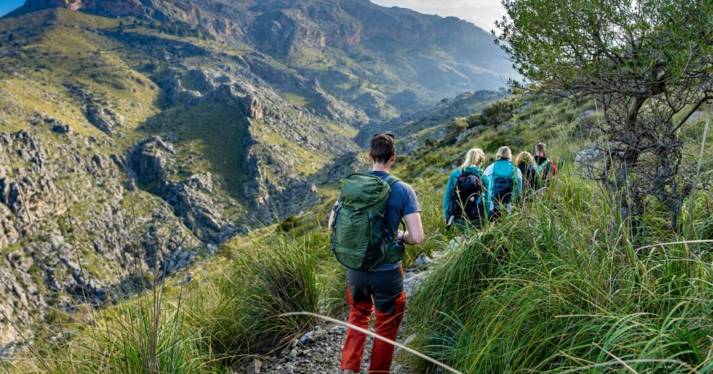 Shutterstock Hikers climbing a mountain