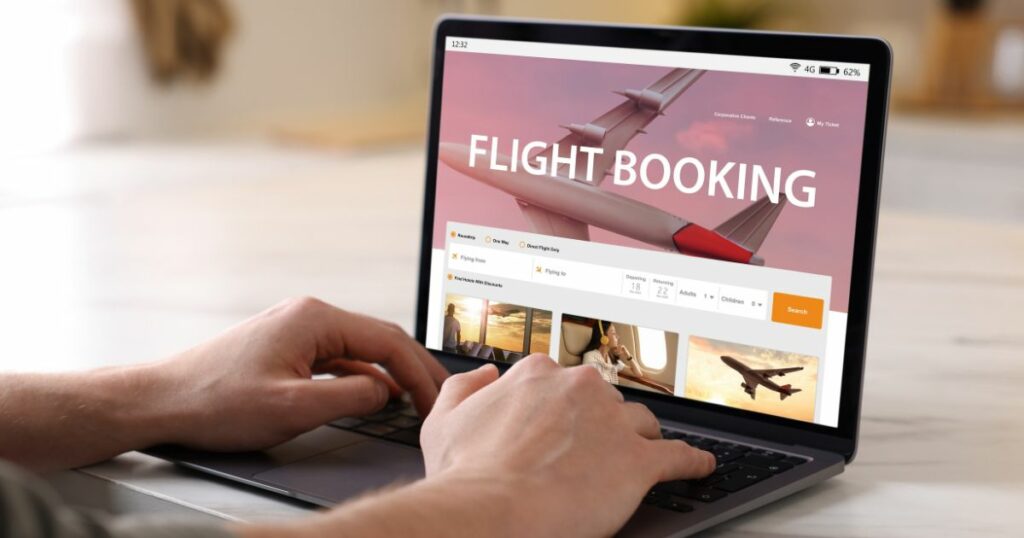 Shutterstock Man using laptop to book a flight