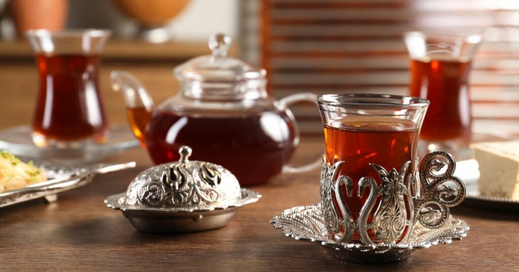 Shutterstock Traditional Turkish tea served in vintage tea set on wooden table