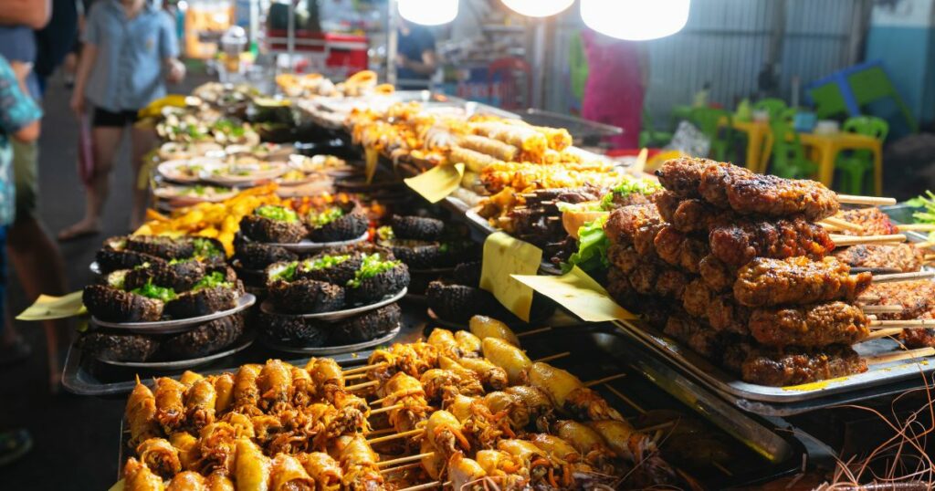 Shutterstock A stall with various delicacies at the night market in Vietnam