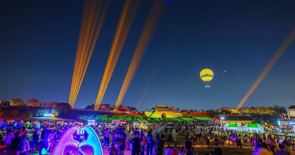 Shutterstock Night view of the show, lights, sounds, and laser lights on the Hwaseomun Gate wall