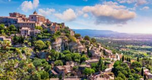 View on Gordes, a small typical town in Provence, France. Discover the stunning hilltop village of Gordes in Provence. Ancient hilltop village of Gordes, Provence, France.