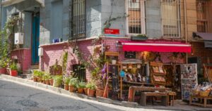 Charming vintage shop on colorful street in Balat, Istanbul, with rustic decor and handmade gift. Traditional boutique selling unique souvenirs art and accessories. Istanbul, Turkey - March 10, 2023