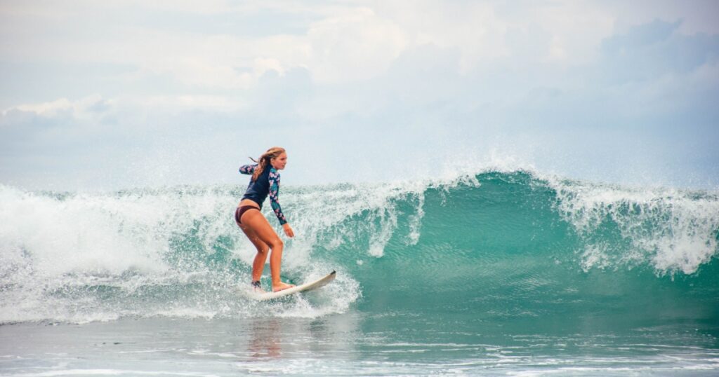 Shutterstock Teenage girl learning to surf in Arugam bay Sri Lanka