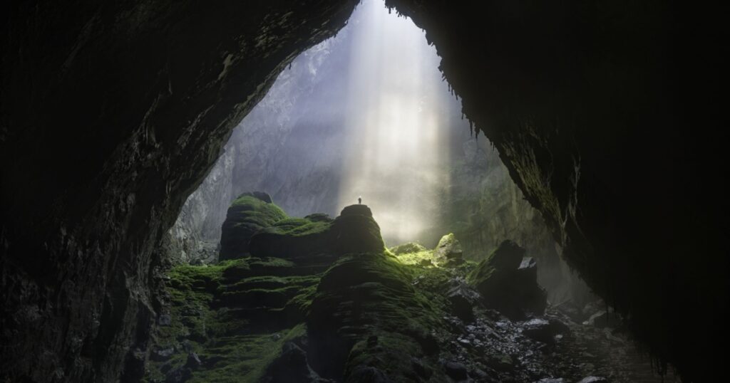 Shaft of light beaming down into Son Doong, the world's largest cave