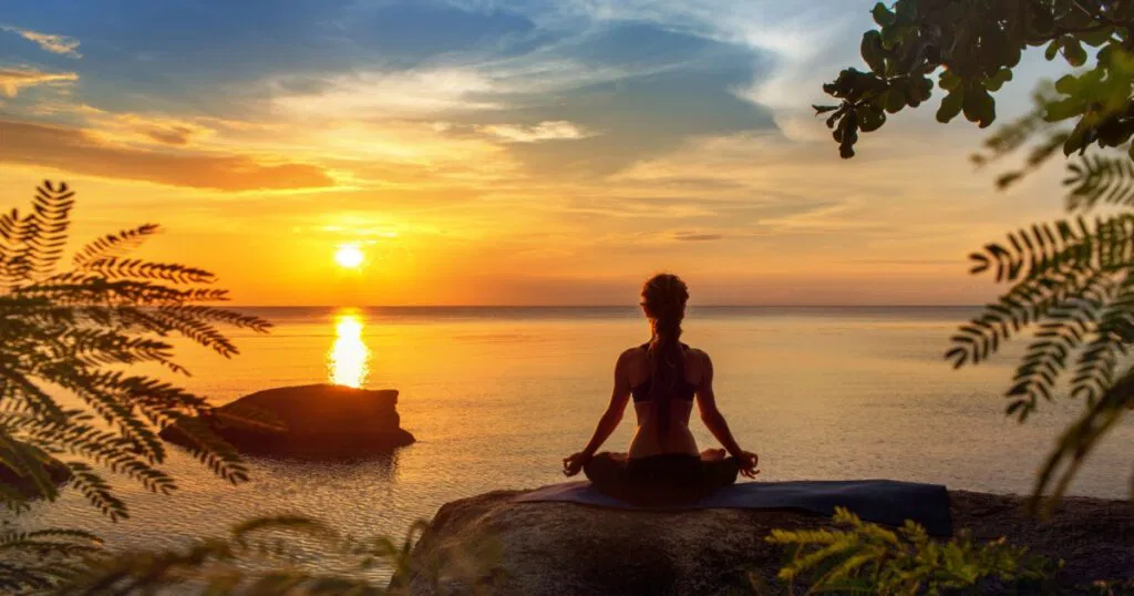 Shutterstock Serenity and yoga practicing at sunset.