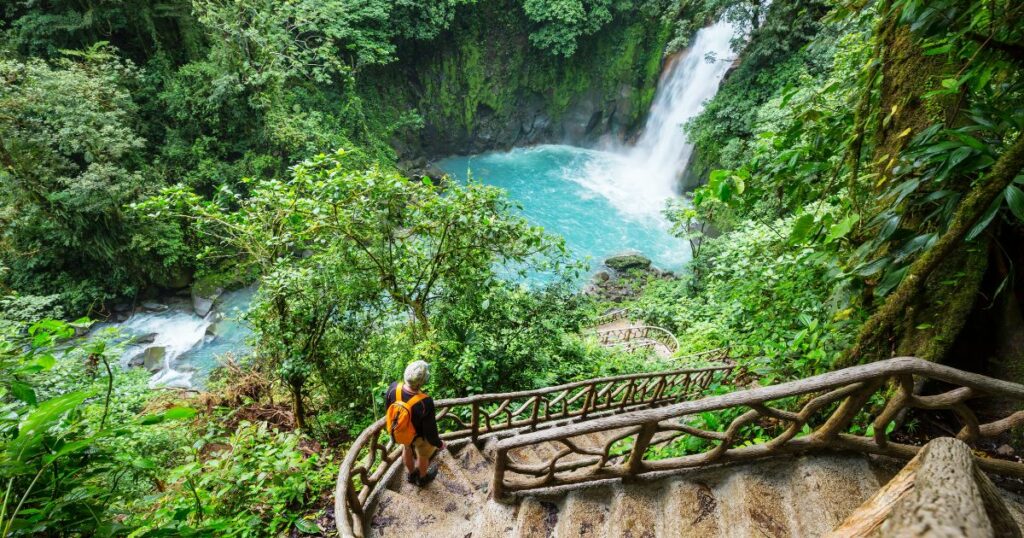 Shutterstock Majestic waterfall in the rainforest jungle of Costa Rica