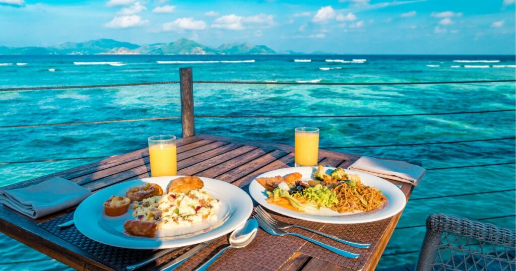 Shutterstock Breakfast with a view of the ocean on a bright summer day