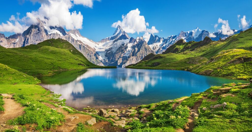 Shutterstock Sunrise view on Bernese range above Bachalpsee lake. Popular tourist attraction. Location place Swiss alps, Grindelwald valley, Europe.
