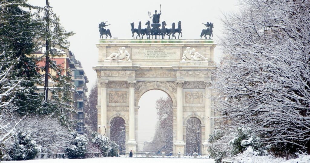 Shutterstock Peace Arch covered with snow in Sempione park, Milan, Italy.