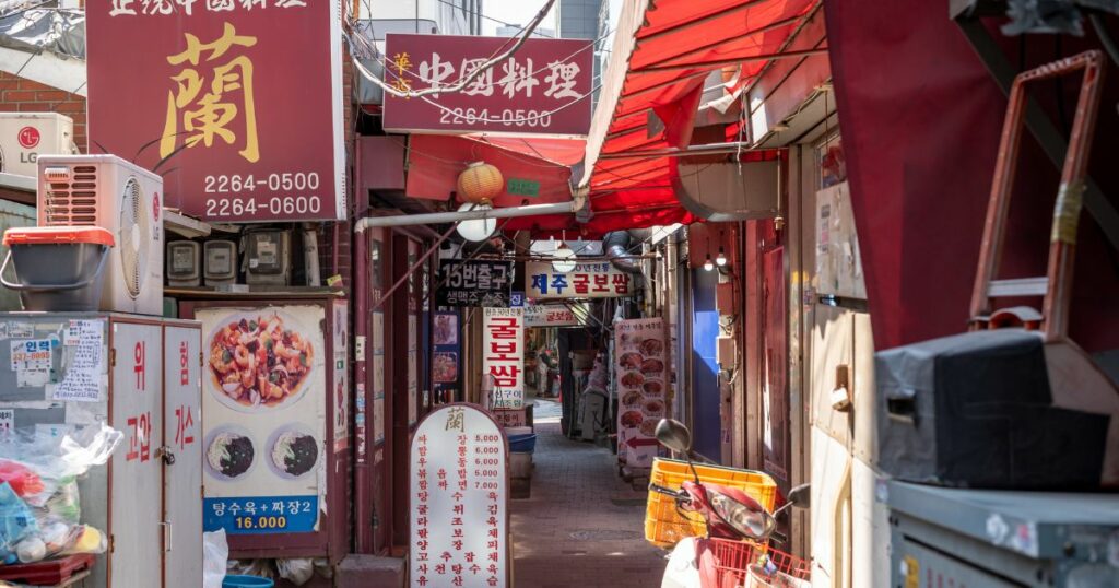 Shutterstock View of a small alley in Jongno 3-ga Bossam