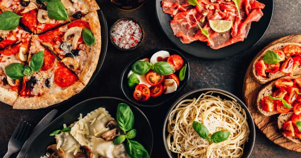 Shutterstock Full table of Italian meals on plates