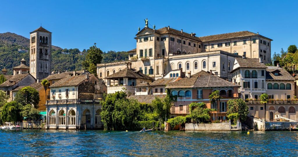 Shutterstock View of old abbey and monastery on San Giulio island on Lake Orta in Piedmont, Northern Italy.