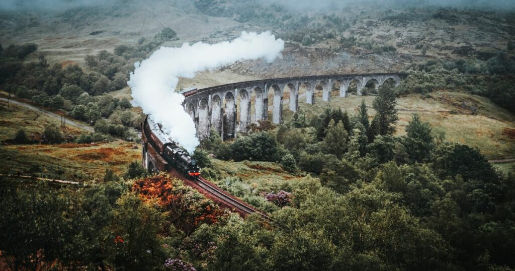 Shutterstock A train on a scenic bridge in Scotland