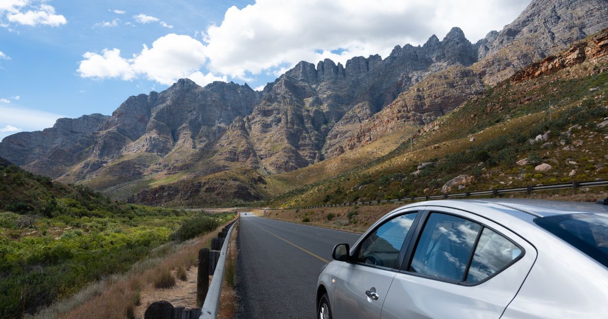 Scenic highway among rocky mountains at South Africa. Car road trip concept