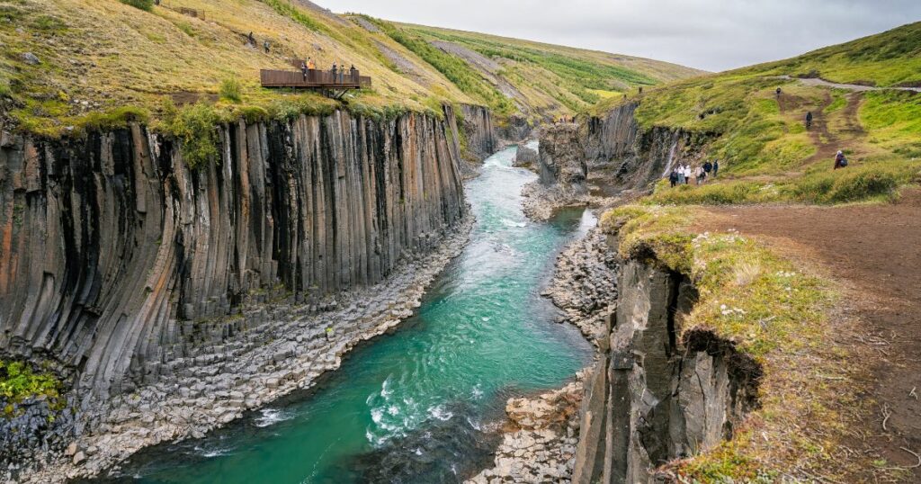 Shutterstock Stuðlagil Canyon, a river beetween basalt columns in Iceland