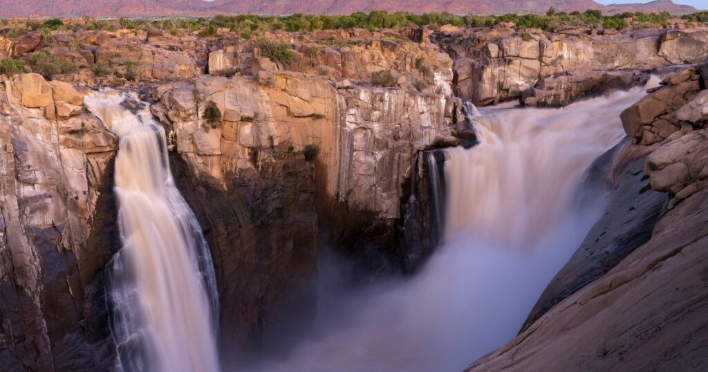 Shutterstock View of the main waterfall on the Orange River at Augrabies Falls National Park
