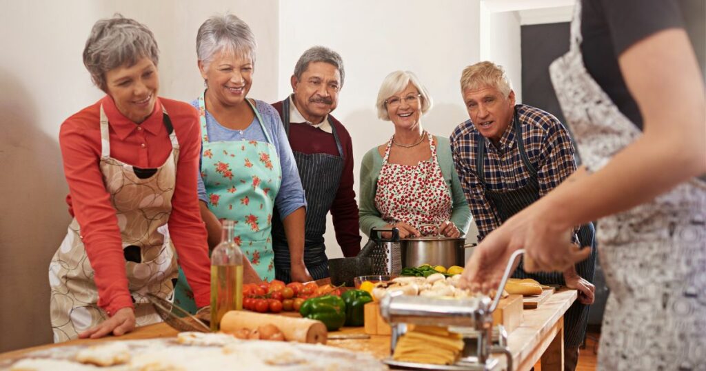 Shutterstock A group of old people attending a cooking class in Italy
