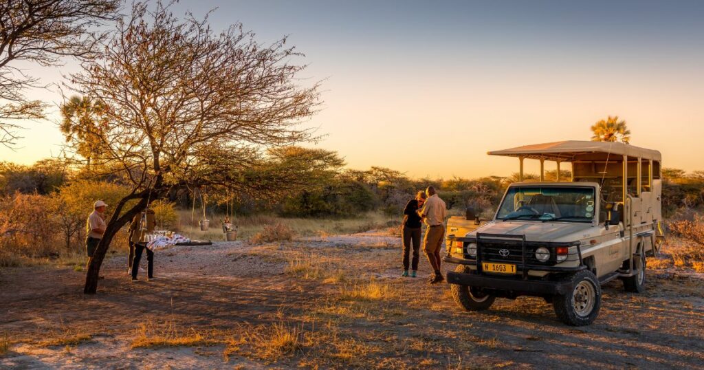 Shutterstock Tourist at a site in Namibia during sundown