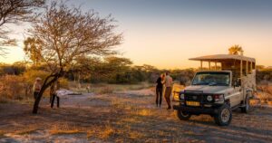 Tourist at a site in Namibia during sundown