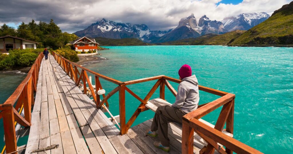 Shutterstock Woman enjoying the view in Torres Del Paine National Park, Patagonia, Chile, South America