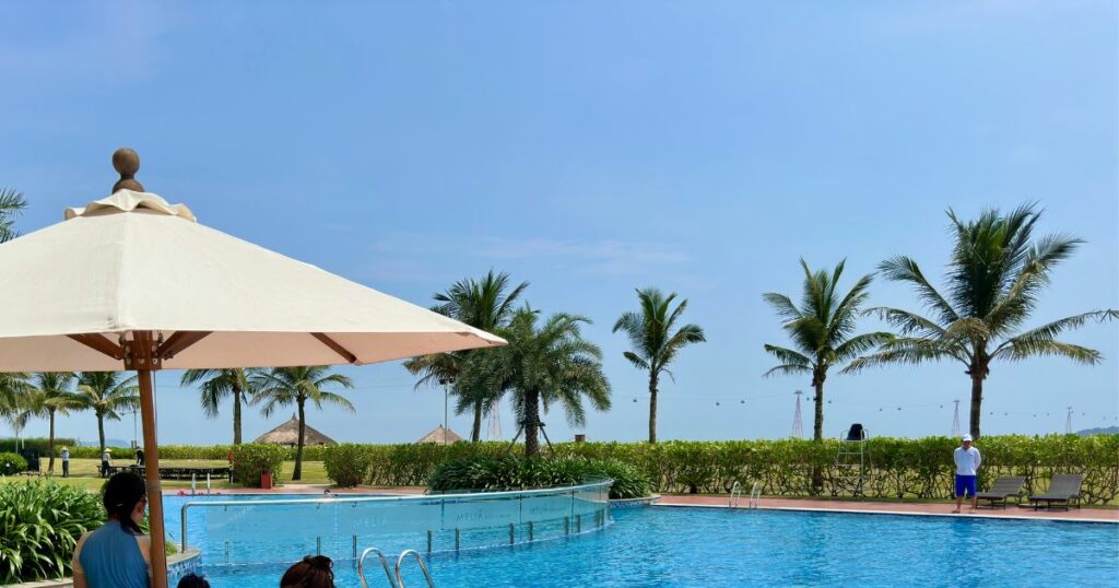 Shutterstock Swimming pool with clear blue water at a beach resort