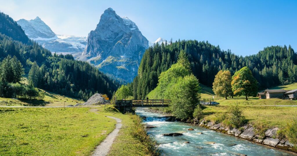 Shutterstock Beautiful view of Rosenlaui with wellhorn swiss alps and Reichenbach river in summer on sunny day at Canton of Bern, Switzerland