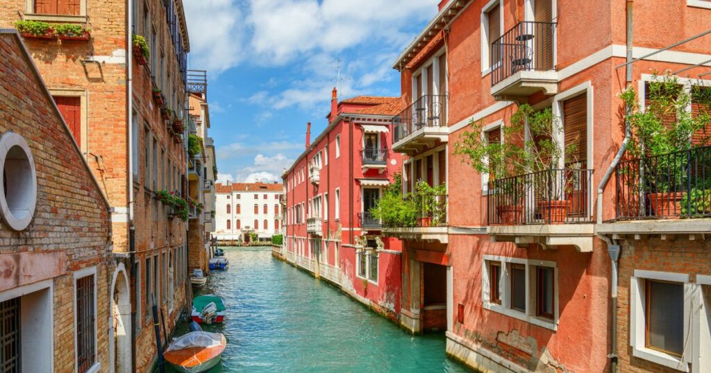 Shutterstock Beautiful view of colorful facades of old houses and the Rio Marin Canal from the Ponte de la Bergami in Venice, Italy.
