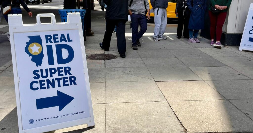 Shutterstock Sign shows where to apply for real ID before the May 7 deadline in Chicago