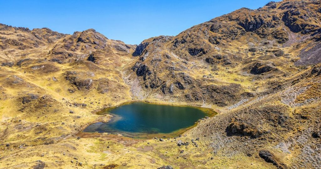 Shutterstock Scenic view of high-altitude lakes and dry rolling hills under a vivid blue sky in the Andes. Remote and peaceful nature landscape perfect for outdoor and travel concepts.
