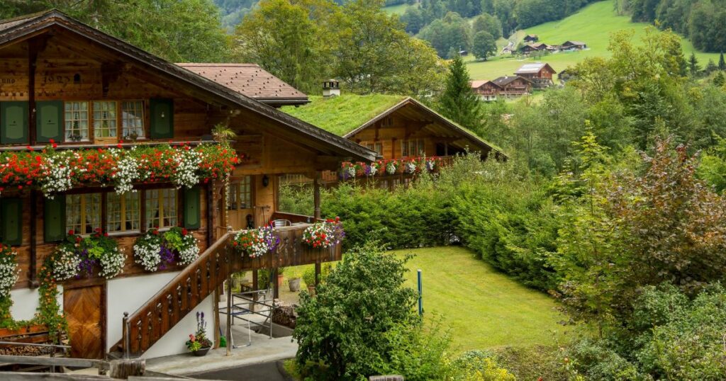 Shutterstock Swiss chalets in the Laturbrennen valley