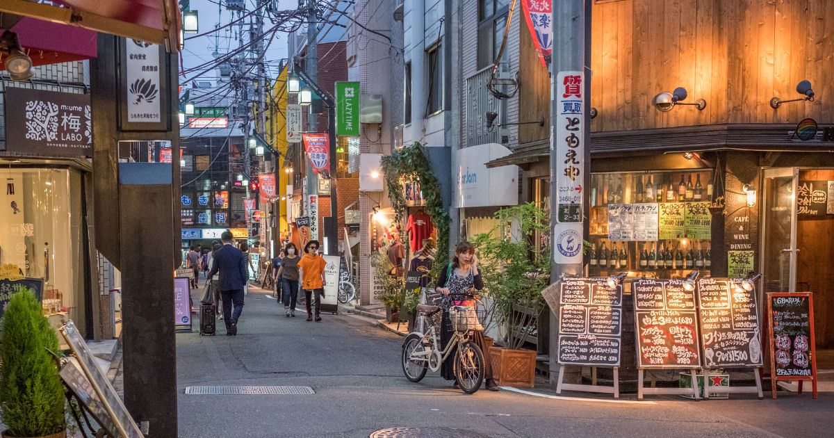 TOKYO, JAPAN - JULY 1ST, 2017. People in the street of Shimokitazawa district. This Tokyo neighborhood is known for small independent fashion retailers, cafes and entertainment venues.