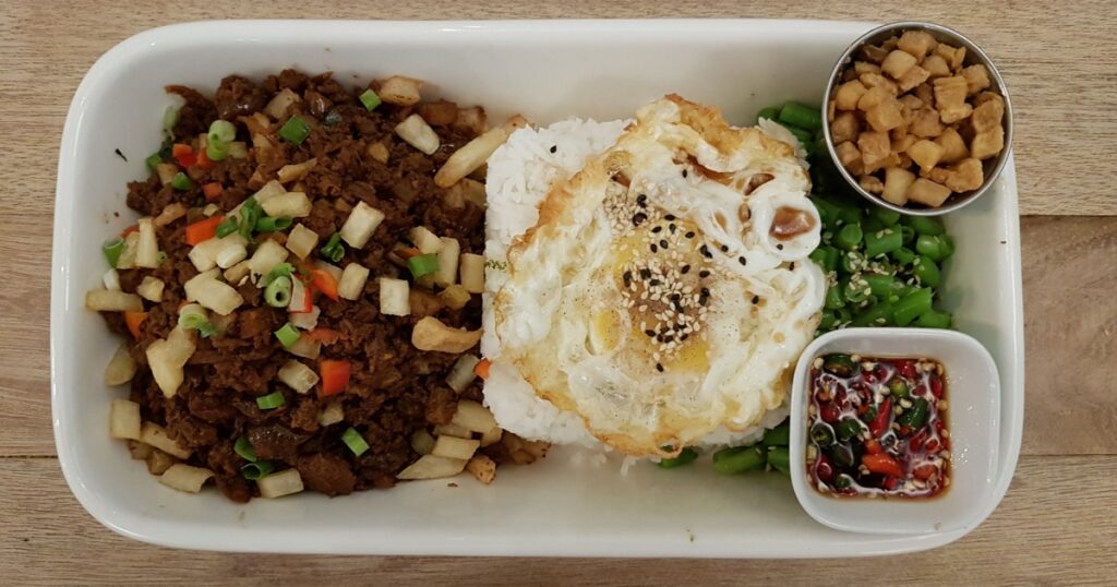 Macau Macao Potuguese Macanese Minchi Minced Pork and Long Beans Rice Meal with fried egg