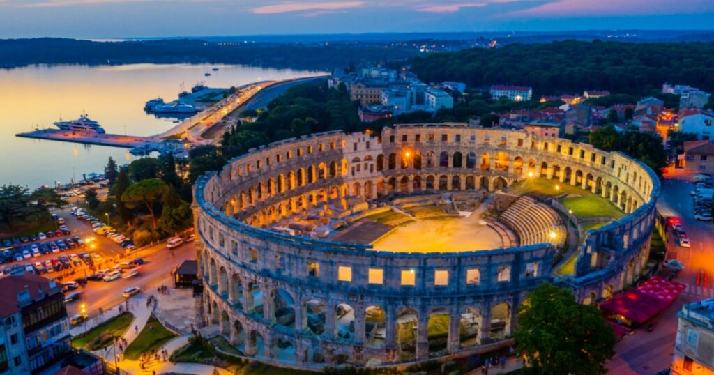 Sunset aerial view of Roman amphitheatre in Pula, Croatia