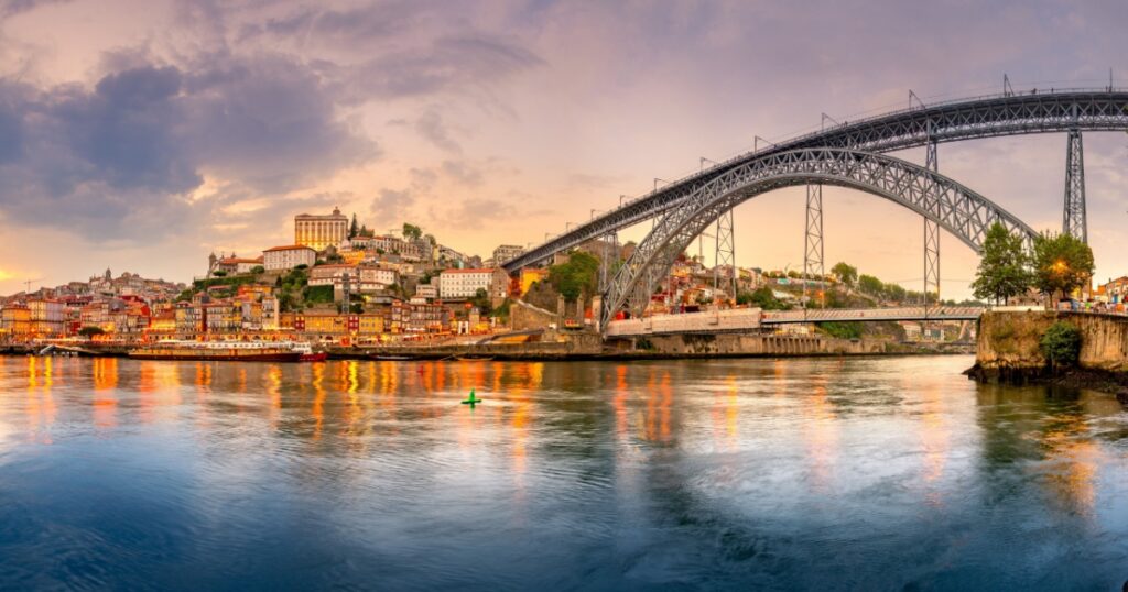 Famous bridge Ponte dom Luis above old town of Porto at river Duoro, Portugal