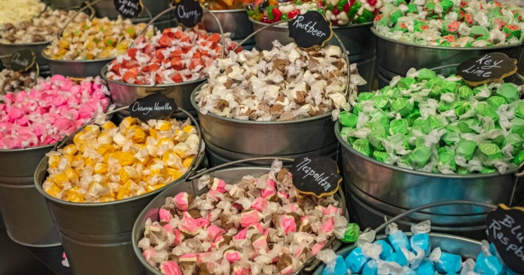 Buckets filled with taffy candy at a candy shop