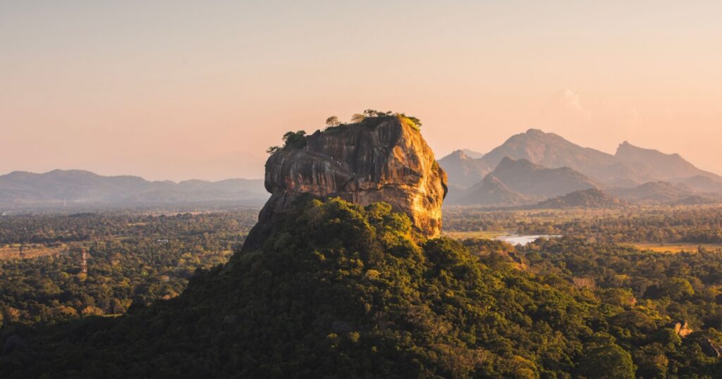 Sigiriya rock also known as Lion Rock at golden light of sunset. Beautiful landscape in Sri lanka.