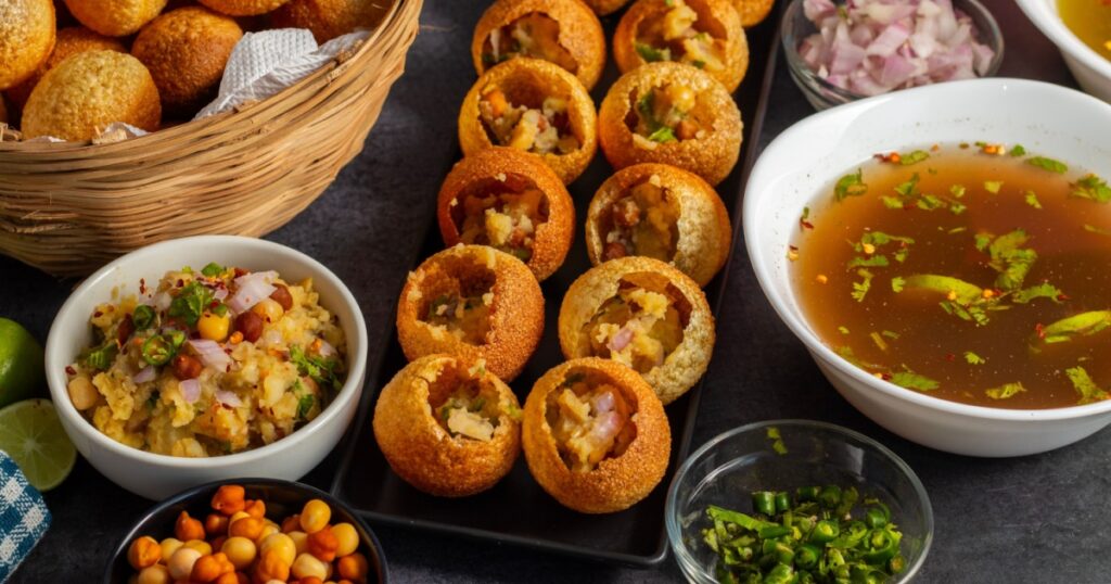 Selective focus of Indian popular snack "papri chaat" or "pani puri".