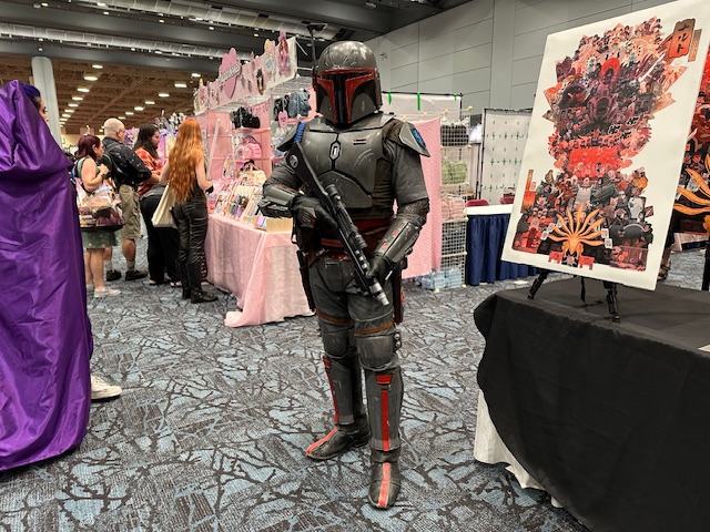 Coplayer dressed as Boba Fett from films The Empire Strikes Back and Return of the Jedi