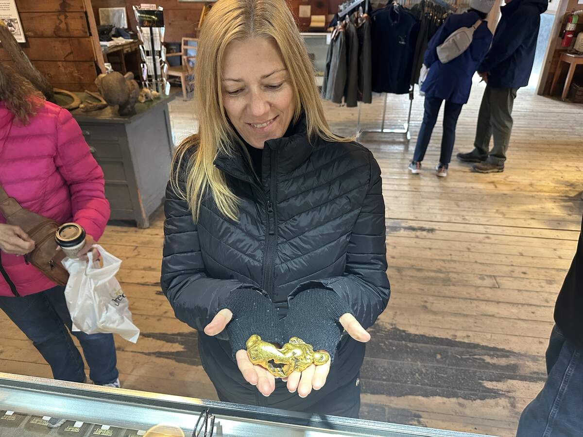 The author holding a large gold nugget.