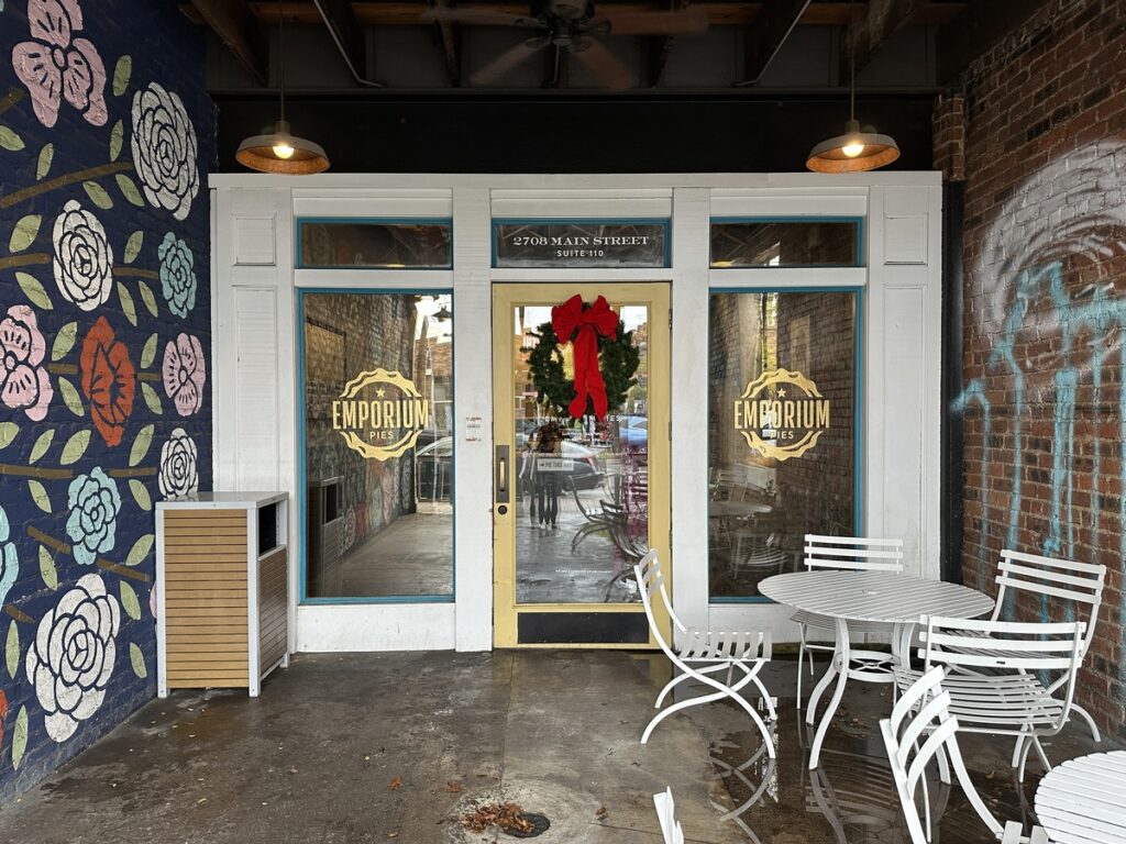 At Velvet Taco, a vibrant mural and twinkling string lights turn the covered patio into a lively gathering spot between food-tour stops.