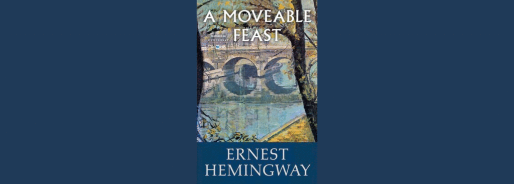 Book cover of A Moveable Feast by Ernest Hemingway showing a painterly image of the Seine River in Paris with a stone bridge and autumn leaves.