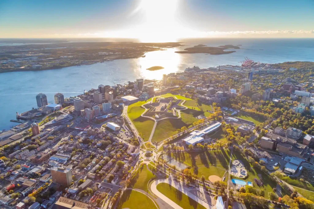 Aerial view of Citadel Hill and Halifax Harbour under bright sunlight.