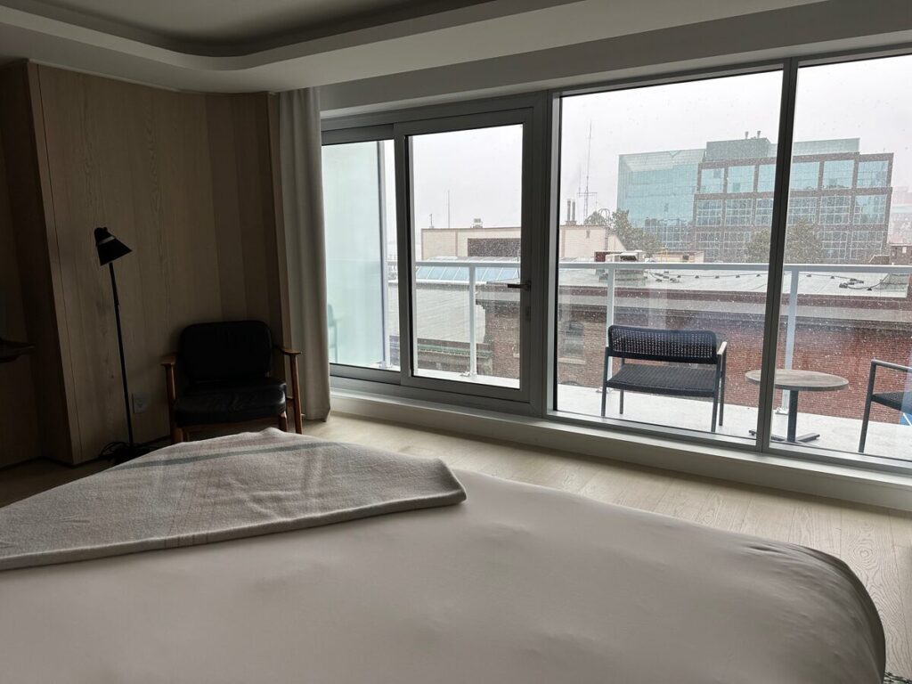 A snowy day in downtown Halifax framed the Maritime Museum of the Atlantic through my hotel window at the Muir. As flakes drifted over the harbour, the quiet view prompted a deeper meditation on Titanic’s final hours and on Halifax’s role in the recovery that followed. The weather outside was wintry and alive, yet the history it called up was defined by something more chilling: a cold, black stillness at sea.